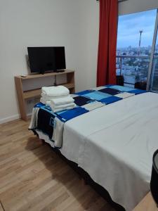 Ένα ή περισσότερα κρεβάτια σε δωμάτιο στο Premium Tower metropolitan