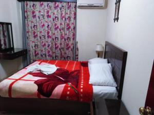 Ein Bett oder Betten in einem Zimmer der Unterkunft Lasirena Resort Aqua Park-Family Only