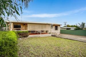 a house with a yard in front of it at Cave Street Retreat - 38 Cave Street Goolwa Beach - BYO Linen in Goolwa South