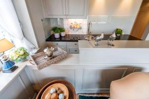 Nhà bếp/bếp nhỏ tại Soenshoern-8-Rechts