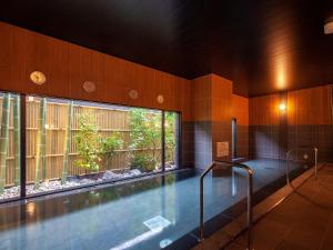 Bazén v ubytování Hotel Route Inn Miyoshi Ekimae nebo v jeho okolí