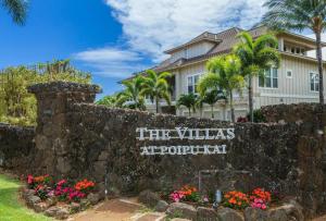 a sign in front of a villas atypical at F211 Second Floor 3-bedroom Poolside Lanai in Koloa +22 photos