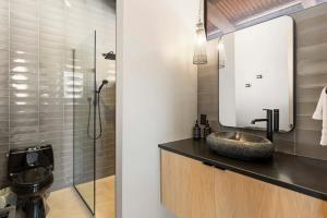 a bathroom with a sink and a mirror at Zion loft with canyon views - unit 1 in Springdale