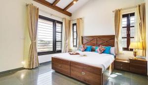Un ou plusieurs lits dans un hébergement de l'établissement Nirvana villa entire 2bhk