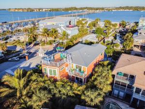 an aerial view of a house with a marina at Playa Esmeralda Vacation Home Up To 14 People in Bradenton Beach