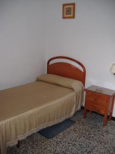 Postel nebo postele na pokoji v ubytování Pensión San Andrés I