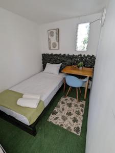 Cama o camas de una habitación en Surf Camp Playa Negra