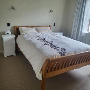 Postel nebo postele na pokoji v ubytování Wine trails, Country & Coast