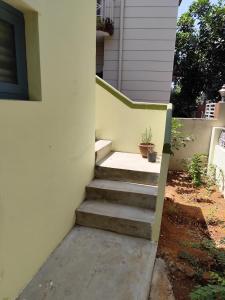 a set of stairs leading to a house at Park View in Mysore