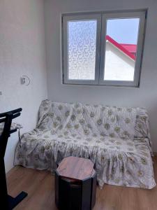 Ένα ή περισσότερα κρεβάτια σε δωμάτιο στο DAMIEN apartments +2 φωτογραφίες