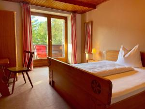 A bed or beds in a room at Drauradweg Hostel
