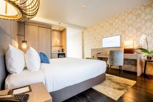 Postel nebo postele na pokoji v ubytování Divalux Resort & Spa Bangkok, Suvarnabhumi Airport-Free Shuttle + 37 fotografií
