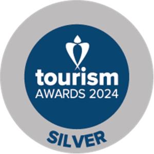 a logo for the tourism awards at BELLA CISTERNA in Kambos