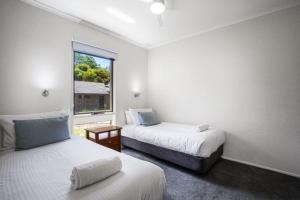 The Bright Resort tesisinde bir odada yatak veya yataklar