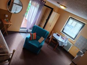 Posezení v ubytování Möbliertes Zimmer