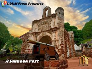 an old brick building with a cannon in front of it at Attic Home Melaka Imperio Residence & Jonker in Malacca