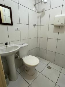Koupelna v ubytování Quarto privativo em residência ótima localização