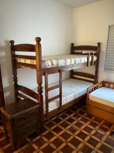 Postel nebo postele na pokoji v ubytování Quarto privativo em residência ótima localização