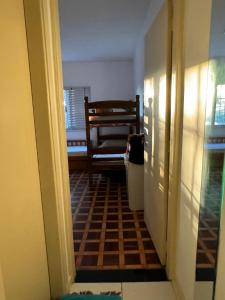 Postel nebo postele na pokoji v ubytování Quarto privativo em residência ótima localização