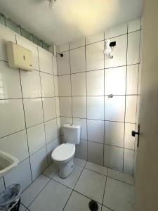 Koupelna v ubytování Quarto privativo em residência ótima localização