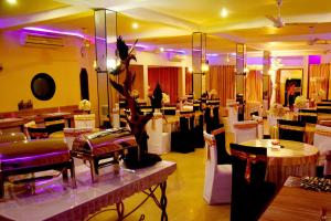 Un restaurant sau alt loc unde se poate mânca la River Top Holiday Resort