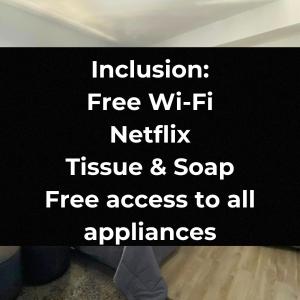 a sign that reads inclusion free wi fi netflix tissue and soap free access to at MesaVirre Garden Residences Unit 402 in Bacolod