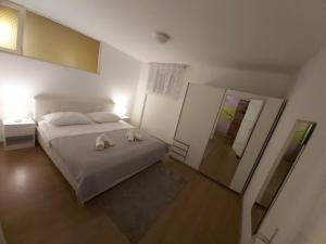 Posteľ alebo postele v izbe v ubytovaní Anamari apartment