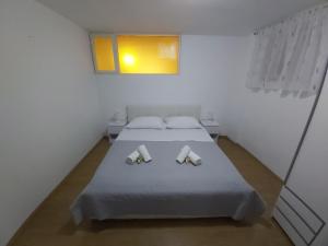 Posteľ alebo postele v izbe v ubytovaní Anamari apartment