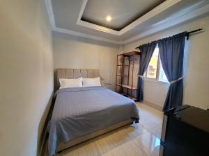 Postel nebo postele na pokoji v ubytování 한라호텔 Halla Hotel