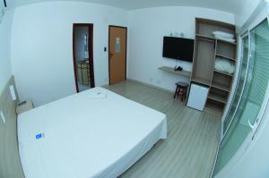 Кровать или кровати в номере Hotel Kloppel