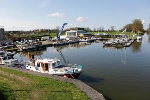 a group of boats are docked in a marina at Kuhnle-Tours Niderviller Apartments in Niderviller
