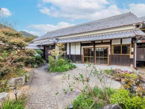 Zahrada ubytování Tetsu-juro former Ogunis residence , Himeji Castles back parlor-like"400-year-old inn"