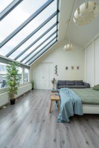 Posezení v ubytování Penthouse Amsterdam Dam Square