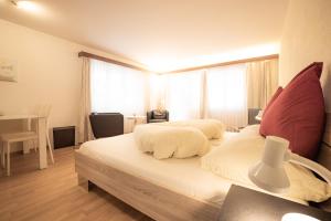 Postel nebo postele na pokoji v ubytování Casa Viva Bad Ragaz