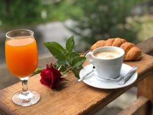 a cup of coffee and a glass of orange juice at Dilijan Park Resort & Villas in Dilijan