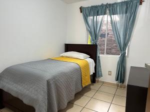 Postel nebo postele na pokoji v ubytování Casa Los Arrayanes