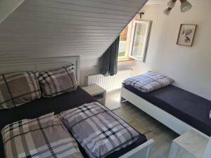 Posteľ alebo postele v izbe v ubytovaní Pavlinka Cottage - HOT TUB - SAUNA