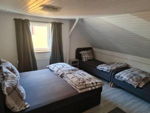 Posteľ alebo postele v izbe v ubytovaní Pavlinka Cottage - HOT TUB - SAUNA