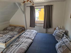 Posteľ alebo postele v izbe v ubytovaní Pavlinka Cottage - HOT TUB - SAUNA