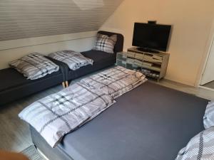 Posteľ alebo postele v izbe v ubytovaní Pavlinka Cottage - HOT TUB - SAUNA