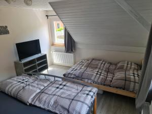 Posteľ alebo postele v izbe v ubytovaní Pavlinka Cottage - HOT TUB - SAUNA