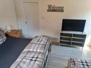 Posteľ alebo postele v izbe v ubytovaní Pavlinka Cottage - HOT TUB - SAUNA
