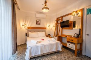 Кровать или кровати в номере Jasmine Marmaris