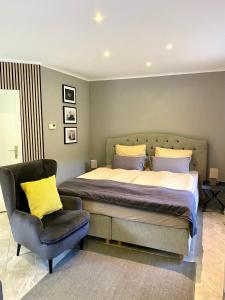Ένα ή περισσότερα κρεβάτια σε δωμάτιο στο Bungalow Saaletal