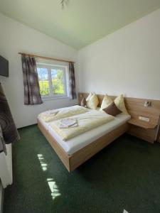 Postel nebo postele na pokoji v ubytování Appartements Sonnwies