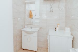 Ванная комната в Pretty Smart Appartment +19 фотографий