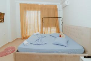 Кровать или кровати в номере Pretty Smart Appartment