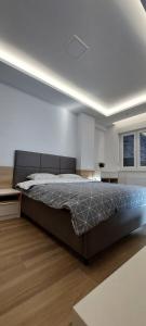 En eller flere senge i et værelse på Stan na dan Borik Banja Luka