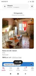 a kitchen and dining room with a table in a room at Maison Cosy et Conviviale, Le B7 in Besset