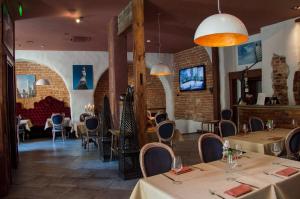 TV a/nebo společenská místnost v ubytování Boutique Hotel Justus
